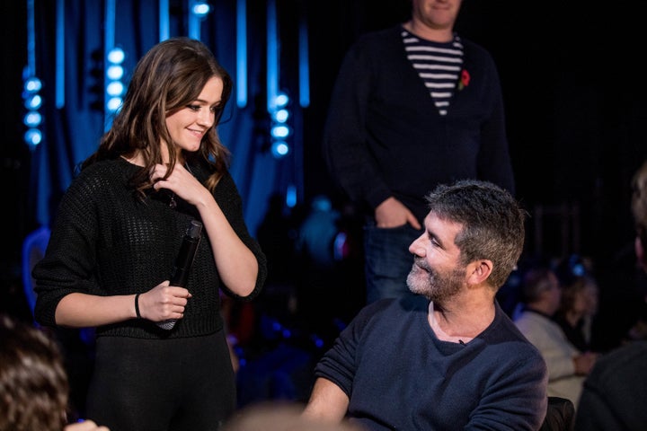 Simon Cowell with former contestant Emily Middlemas