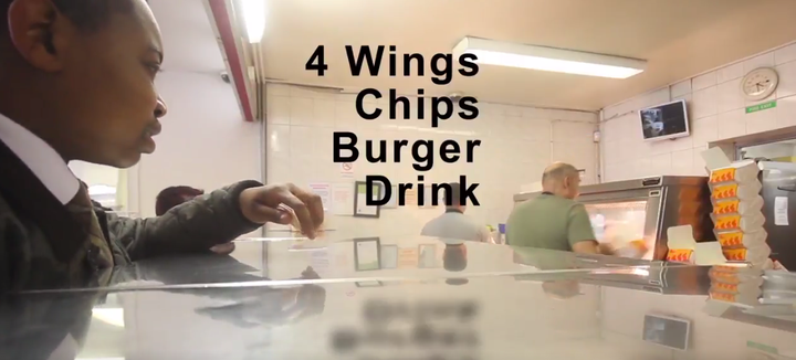 Quashie orders his 'not so peng munch' of wings chips and a burger