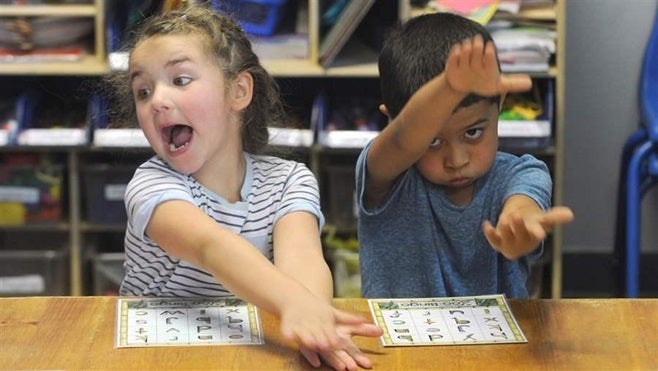 Children play a phonics game at Kids Korner Preschool and Daycare in Idaho Falls, Idaho. Fewer children are served by publicly subsidized child care programs today than a decade ago.