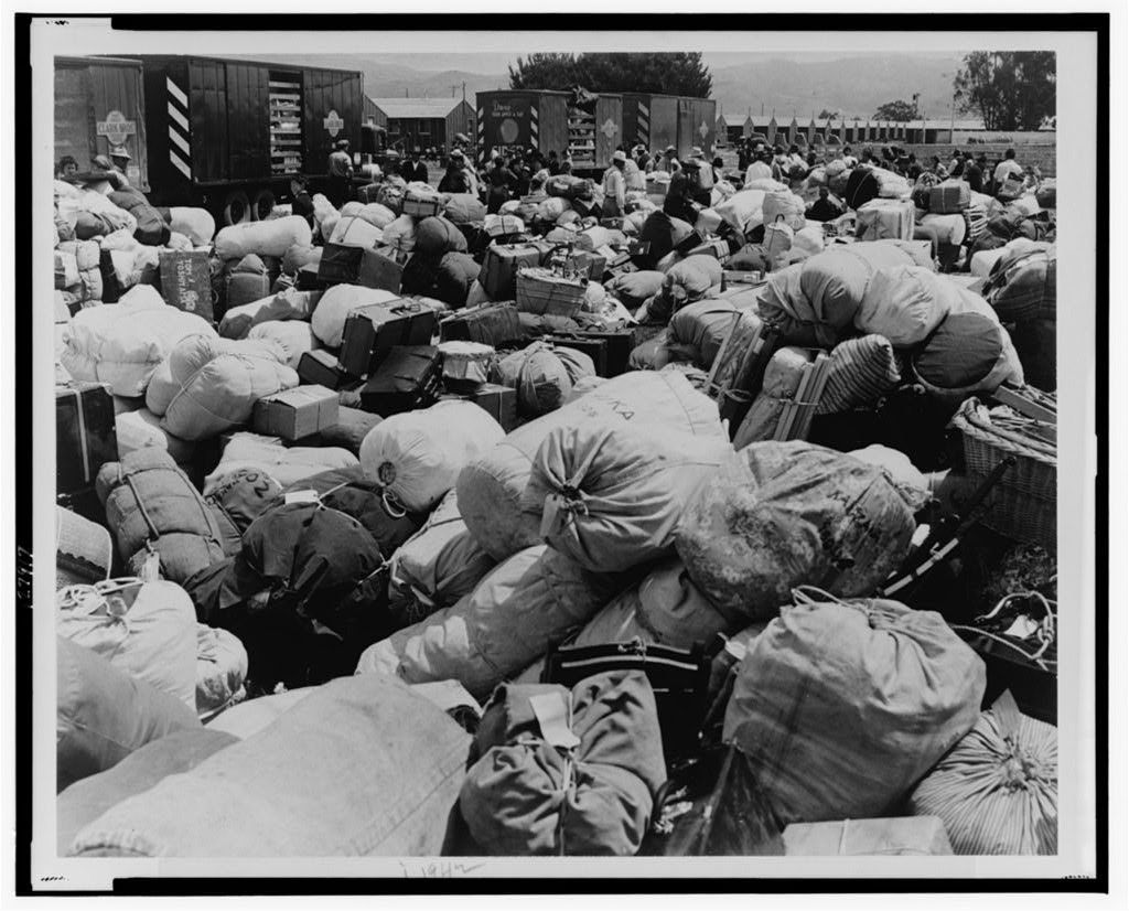 Baggage belonging to prisoners of Japanese ancestry at an assembly center in Salinas, Calif., prior to a "War Relocation Authority center."