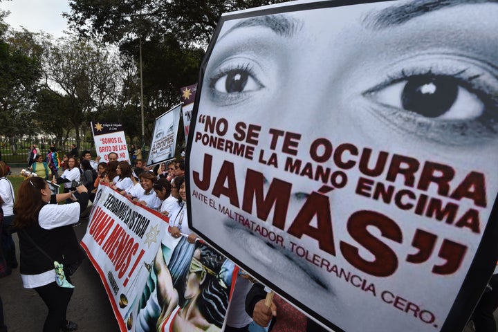 Thousands of demonstrators participate in the "Ni una menos" (Not One Less) march in Lima, Peru. Protestors held banners condemning gender violence and femicide.