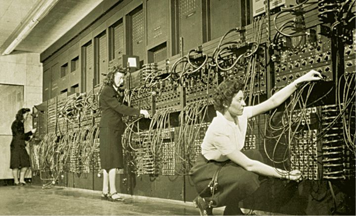 <p>Staff programming ENIAC at University of Pennsylvania, USA, circa 1946</p>