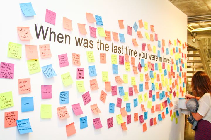 <p>Upon walking in the Love Lost exhibition attendees are asked to write on Post-it notes when was the last time they were in love. </p>