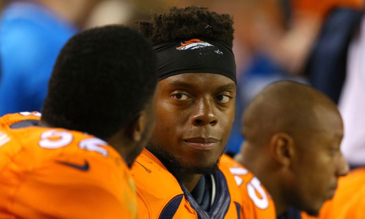 Brandon Marshall of the Denver Broncos looks on from the bench at Mile High Stadium earlier this year in Denver, Colorado.