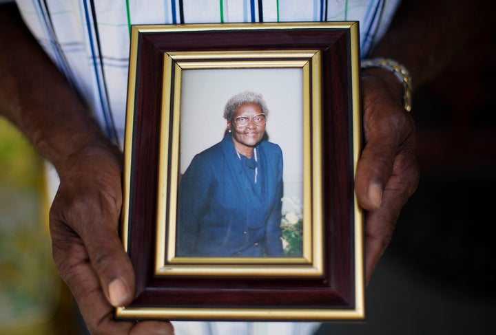 Walter Jackson holds a photo of his mother, Susie, one of the nine people killed in the June 17, 2015, shooting at Emanuel AME Church in Charleston, South Carolina.