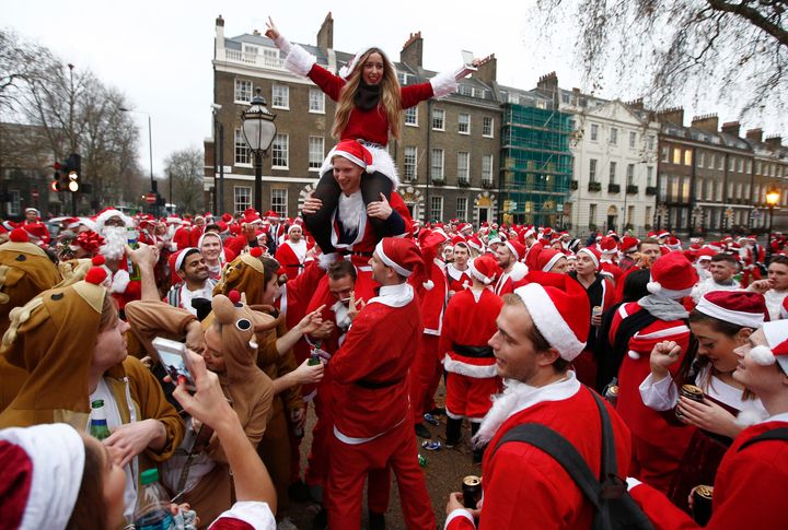 Crowds take part in this year's Santacon.