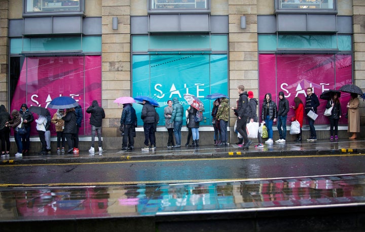 Early morning shoppers queue in hope of a bargain on Boxing Day