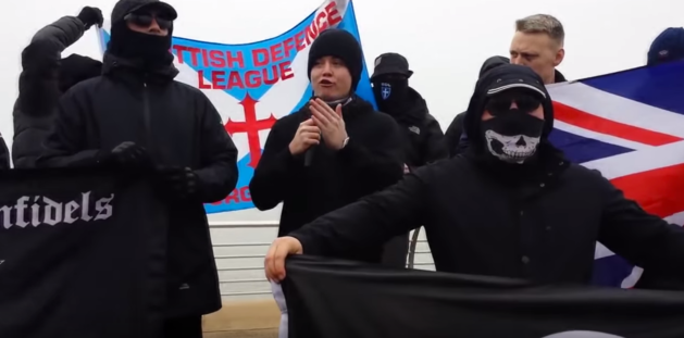 <strong>Jack Renshaw pictured centre during a demonstration in Blackpool is being investigating for inciting racial hatred</strong>
