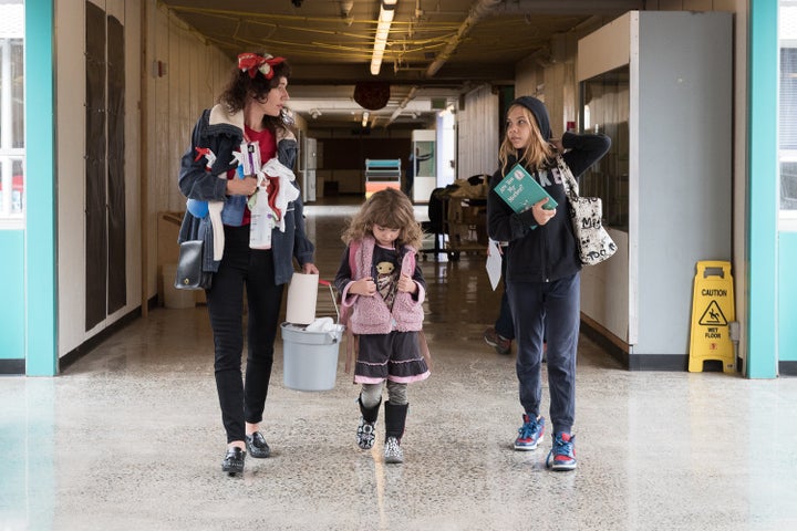 Shawna, 6-year old Minnow, and 12-year old Beezus volunteer to clean schoolrooms at Louisa Boren STEM K-8 on Sep. 6, the day before the start of the school year. Both girls face learning challenges which require extra one-on-one time with teachers.