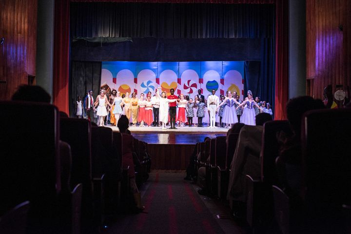 The dancers are greeted with applause from the crowd after the first show of "The Nutcracker" at Nairobi National Theatre.
