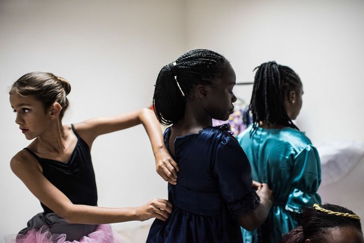 Pamela and two of the other dancers preparing themselves before the show on the opening night.