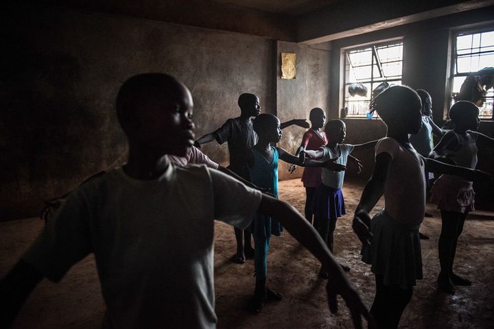 There are around 30 children in the class. even though the space is small, they manage to dance without bumping into each other.