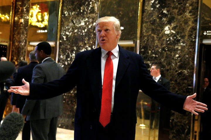 U.S. President-elect Donald Trump speaks to members of the news media at Trump Tower in New York City. Dec. 6.