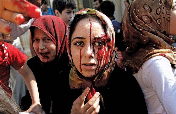 Syrians flee Aleppo as Assad’s forces complete the capture of the rebel’s largest stronghold.