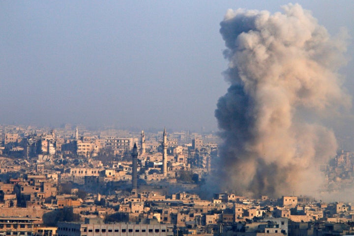 Smoke and debris fill the air amid the siege of Aleppo.