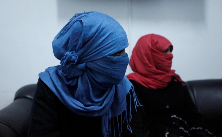 Minya Mesmer (R) is seen with her daughter at a military building in Misrata, Libya, November 6, 2016.