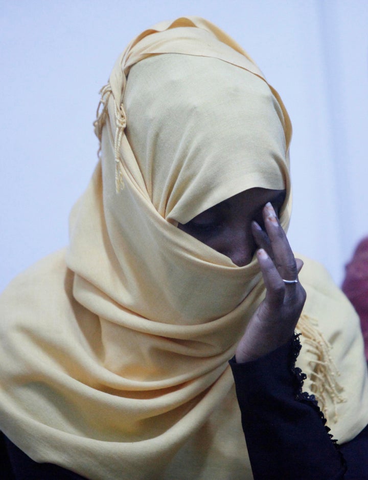 A former hostage of the Islamic State reacts at a military building in Misrata, Libya, November 6, 2016.