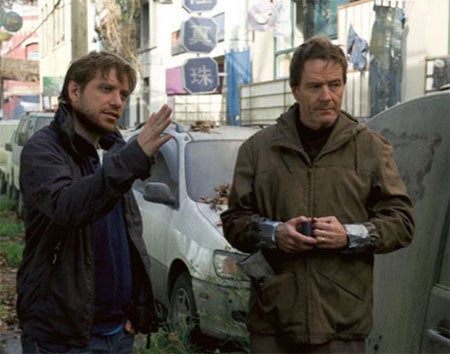 Gareth Edwards with Bryan Cranston on the set of “Godzilla.”