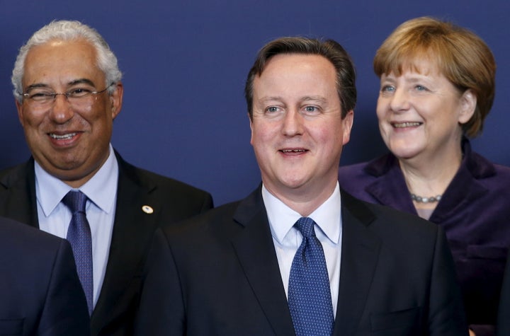 Cameron, Merkel and Portugal's Prime Minister Antonio Costa pose for a photo