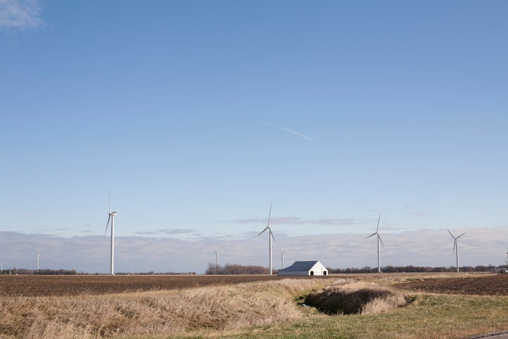 Wind turbines dot the landscape outside my hometown of Delphi, Ind.