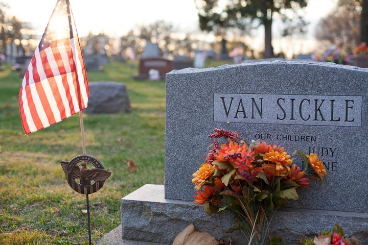 The sun sets behind the grave of my grandfather, Wayne VanSickle, Delphi’s long-time mayor. 