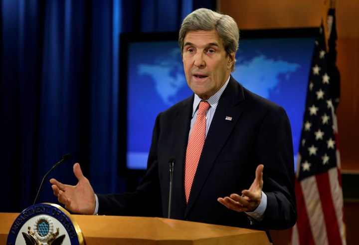 Secretary of State John Kerry defends President Obama's handling of Russian interference in the presidential election at the State Department headquarters Thursday.