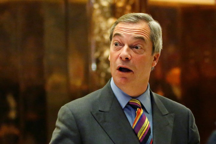 Nigel Farage stands in the lobby of Trump Tower in Manhattan.