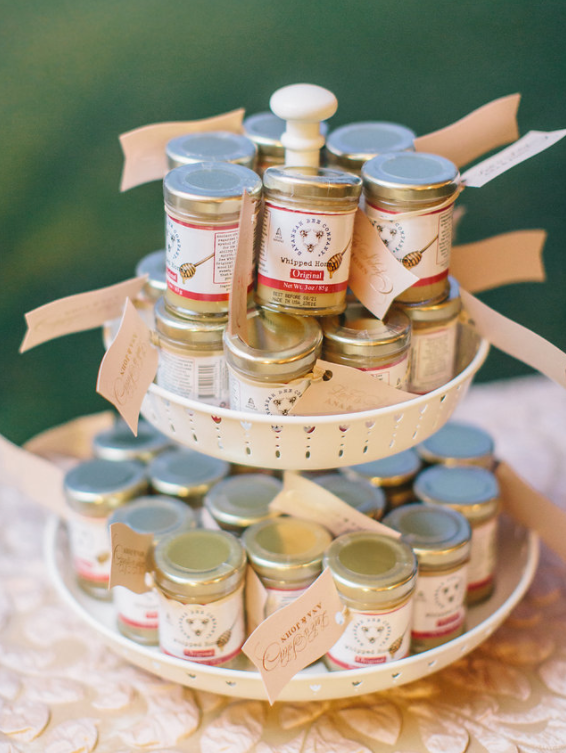Guests received honey wedding favors to take home.