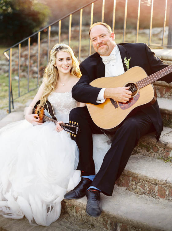 The couple took some time to sit and play their instruments on the big day. 