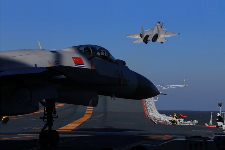 A live-fire drill using an aircraft carrier is seen carried out in the Bohai sea, China, December 14, 2016.