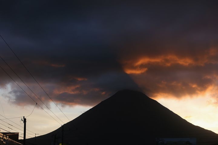 LA FORTUNA, COSTA RICA - MARCH 26: Arenal, a dormant volcano, is seen as the Costa Rican Electricity Institute (ICE) has managed to produce all of the electricity for the nation from renewable energy sources for more than 80 days straight on March 26, 2015 in La Fortuna, Costa Rica. The remarkable milestone has been reached with the use of hydroelectric power plants and a combination of wind, solar, and geothermal energy. (Photo by Joe Raedle/Getty Images) Joe Raedle via Getty Images