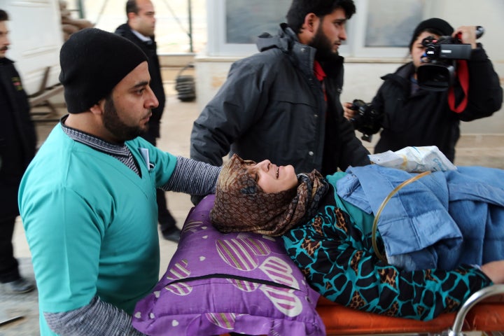 <strong>Evacuated wounded civilians at a hospital in Reyhanli District, located at Turkey's border with Syria on December 16</strong>