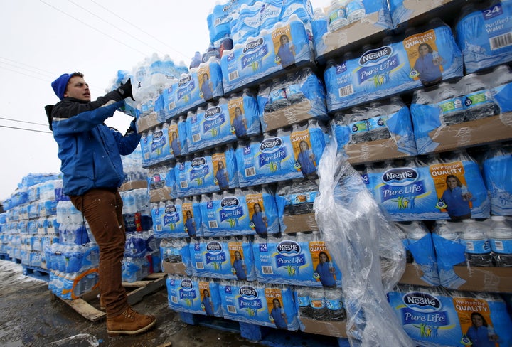 Volunteers distribute water in Flint, Michigan. America's lead-contaminated water problem is likely bigger than we currently