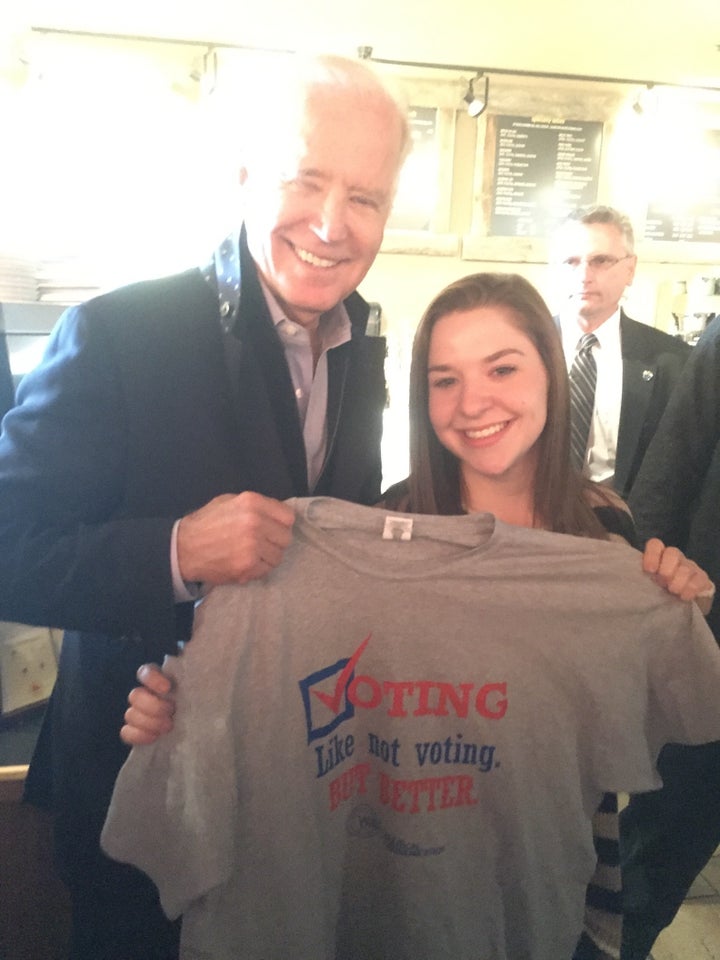 <p>Michelle gives VP Biden his very own “Election Central” T-shirt with the winning student slogan, “Voting. Like not voting, but better.”</p>