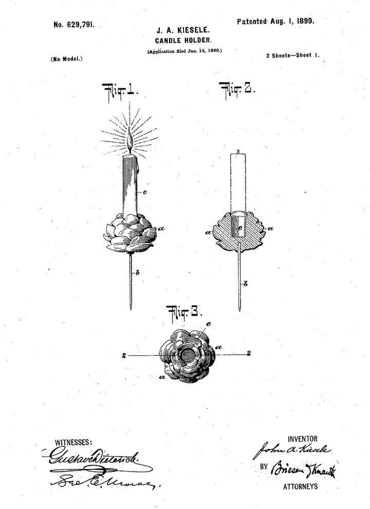 <p>In 1899, this patent was awarded for a Christmas tree candle holder with a pine cone base. It’s mounted on a spike, which attaches the holder to the tree branch or a wreath. </p>