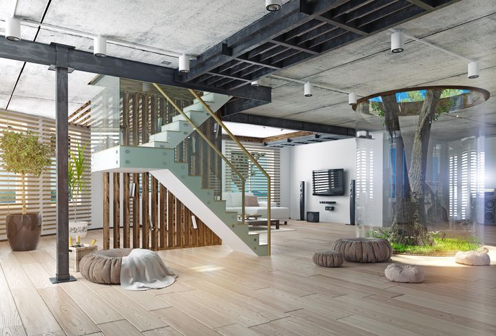 eco design of the modern interior. Real living tree indoor. 3d concept vicnt via Getty Images