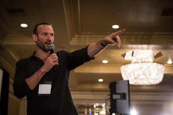 <p><em>Swanwick on-stage: teaching people how to build a multimillion-dollar business.</em></p>