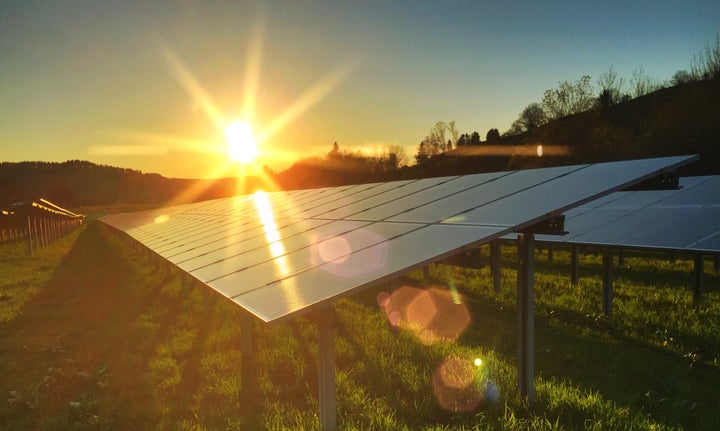 Solar panels at sunset.