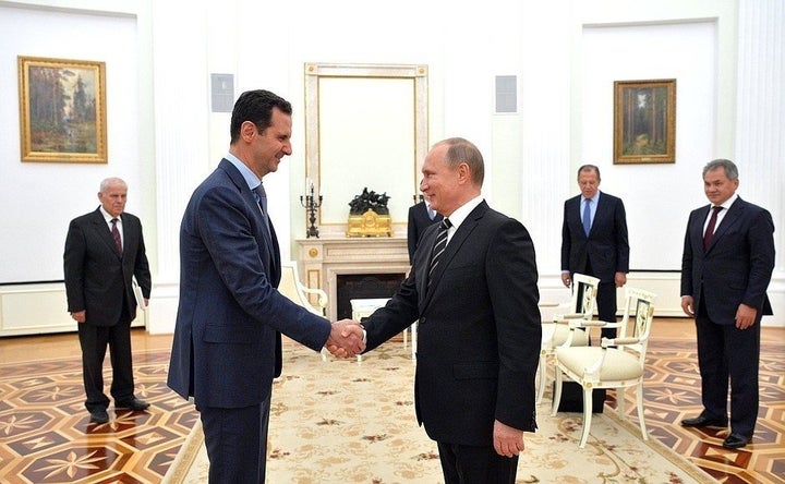 Bashar al-Assad meets with Vladimir Putin at the Kremlin Palace in Moscow, Russia, on October 21, 2015.