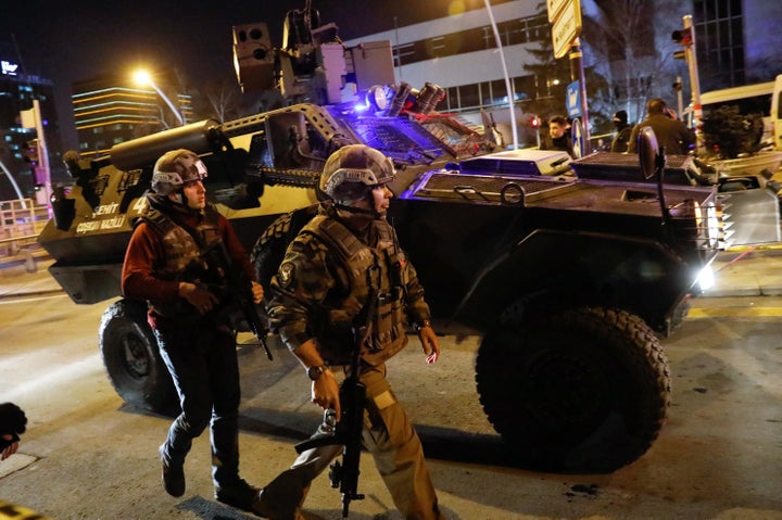 Turkish police secure the area near an art gallery where the Russian Ambassador to Turkey Andrei Karlov was shot in Ankara, Turkey, December 19, 2016.