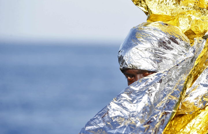 A migrant waits to disembark from the rescue vessel Responder, a rescue boat run by the Malta-based NGO Migrant Offshore Aid Station (MOAS) and the Italian Red Cross (CRI), in the Italian harbour of Vibo Marina, Italy, October 22, 2016.