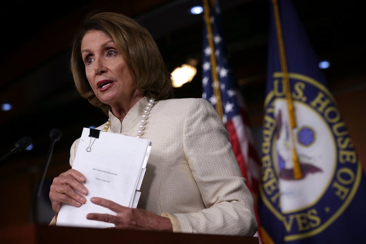 House Minority Leader Nancy Pelosi (D-Calif.) held up a copy of the Joint Comprehensive Plan of Action of the Iran nuclear deal as she announced her support for it.