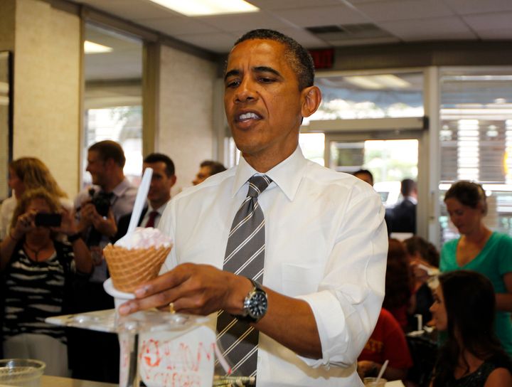 U.S. President Barack Obama buys ice cream at Deb's Ice Cream and Deli in Cedar Rapids, Iowa, July 10, 2012.