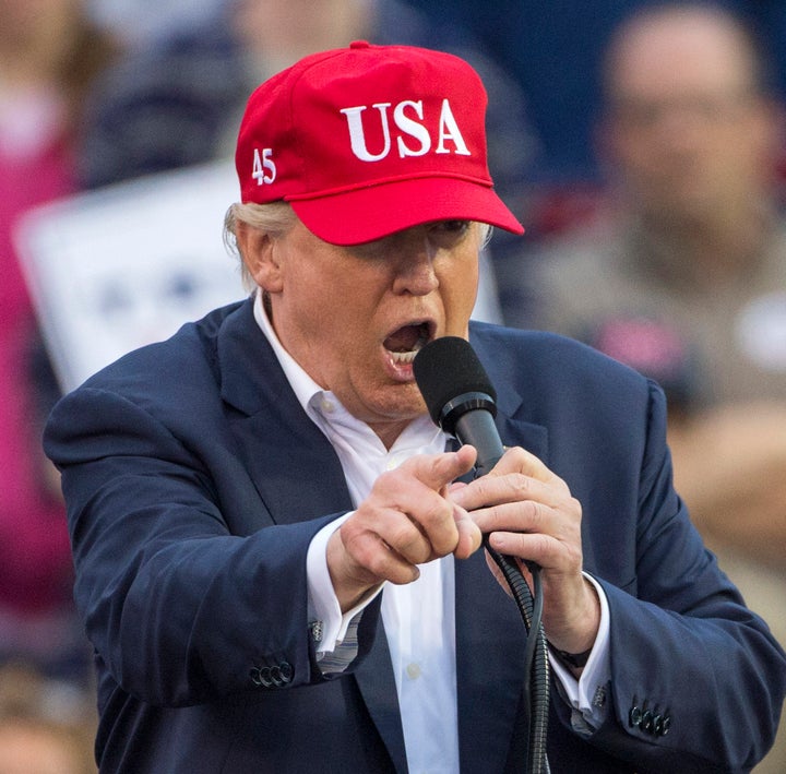 President-elect Donald Trump speaks at a rally Saturday in Mobile, Alabama, where his private security crew kept the peace.