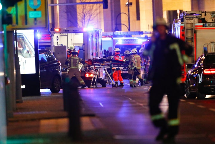 Paramedics work at the site of an accident at a Christmas market on Breitscheidplatz square near the fashionable Kurfuerstendamm avenue in the west of Berlin, Germany, December 19, 2016