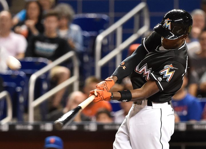 Miami Marlins second baseman Dee Gordon connects for a solo home run during the first inning against the New York Mets at Marlins Park.