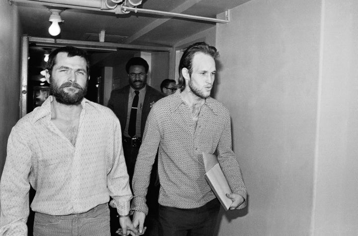 Two male members of the Charles Manson family, Bruce Davis, left, and Steve Grogan, leave court after a hearing on the appoin