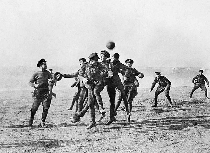 Soldiers play football in No-Man's Land during the Christmas Truce of 1914