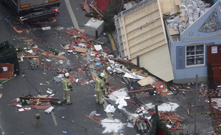 <strong>A trail of devastation is left behind in Berlin, Germany, after a truck ran into a crowded Christmas market and killed 12 people</strong>