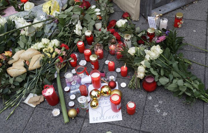 <strong>Candles burn near the scene in Berlin</strong>